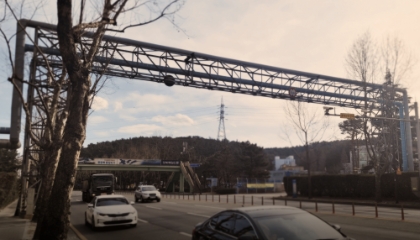 At Pohang Steelworks main gate, make a right before the overpass walkway